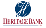 The Heritage Bank Logo.